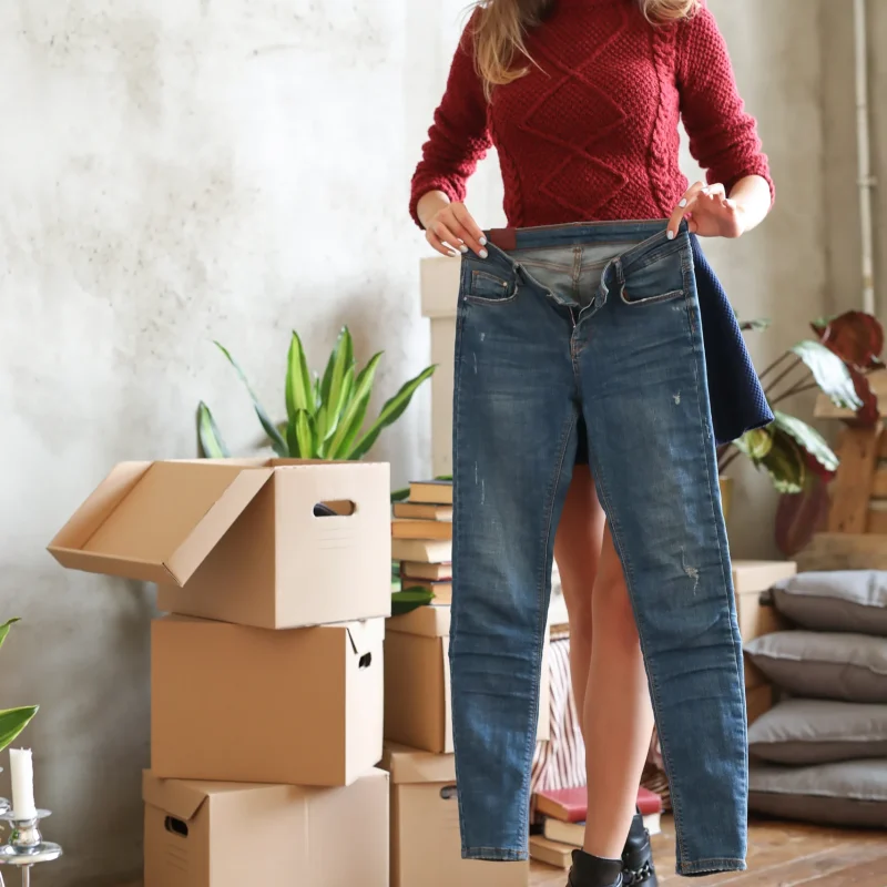 woman prepare to packing clothes for moving