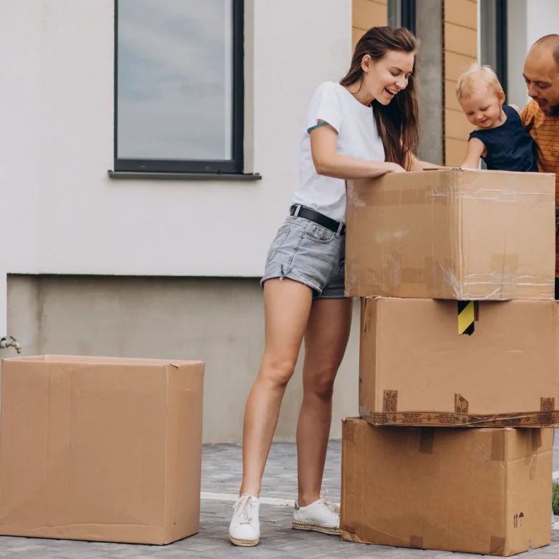 a married couple unpacking boxes